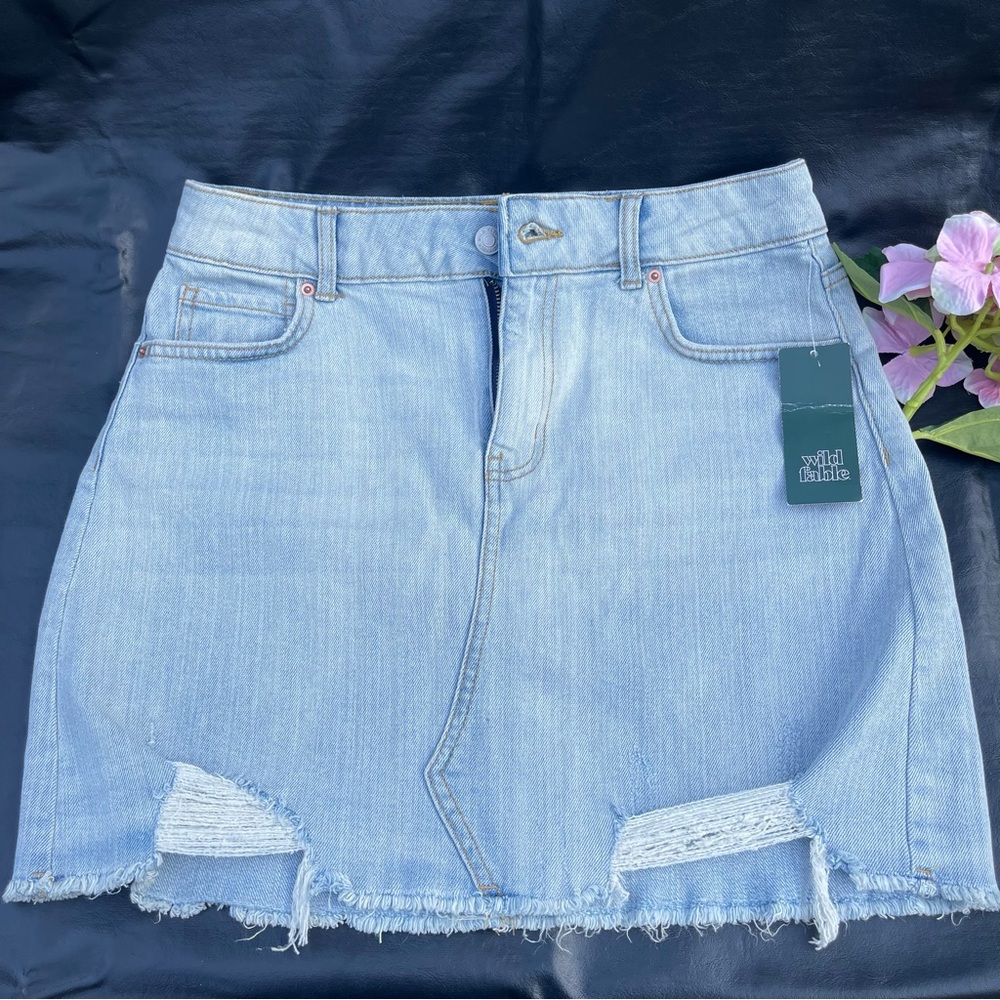 Jean Skirt women Size 6 Blue Denim Pockets Raw Hem Short Mini